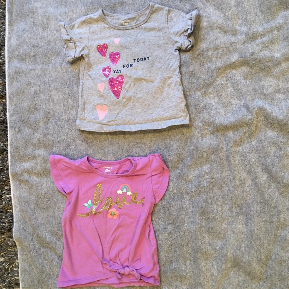 2 Carter’s shirts; size 24 Mos